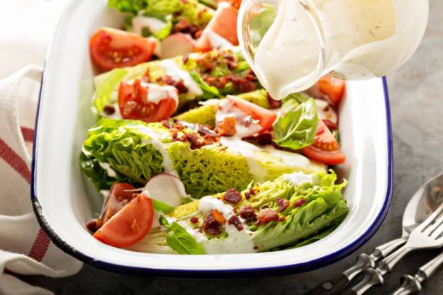 Wedge salad with baby lettuce and tomatoes