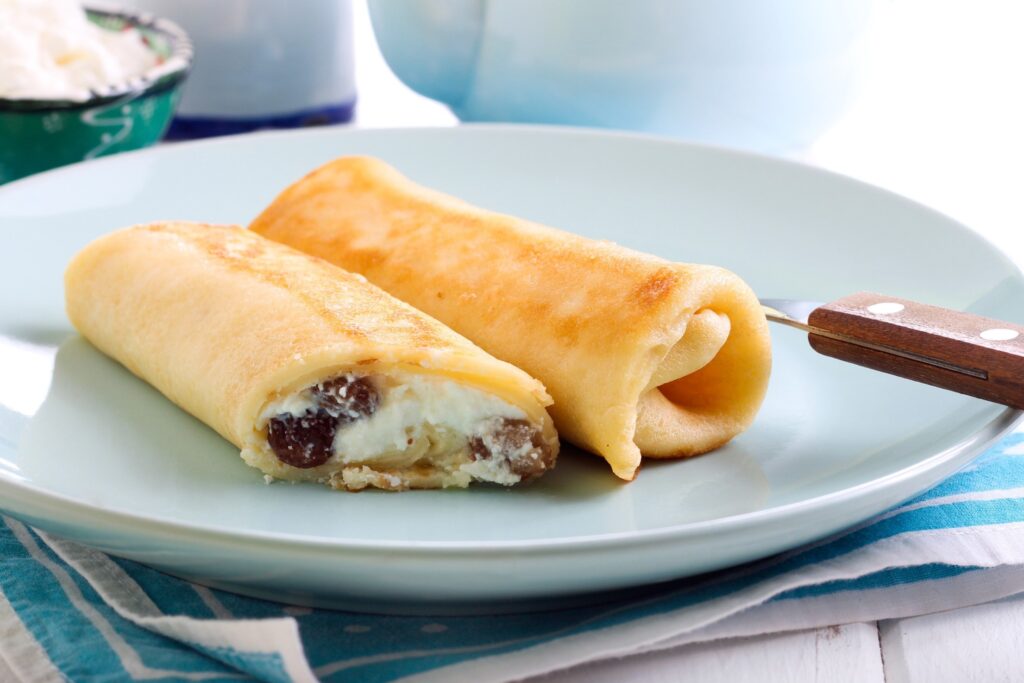 Pfannkuchenröllchen mit Ricottafüllung